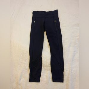 Cropped Lululemon Leggings with Mesh and Zipper Details